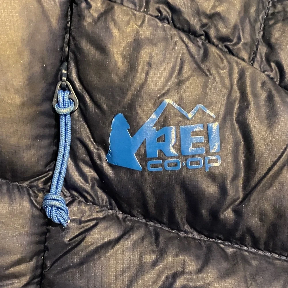 REI Black Insulated Puffer Jacket with Blue Logo and Drawcord